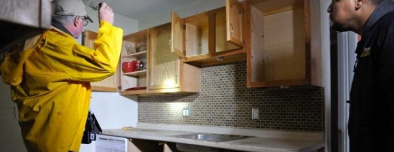 two men doing house inspection