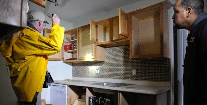 two men doing house inspection